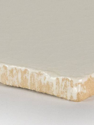 Carrelage mural type terre cuite émaillée couleur blanc cassé
