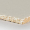 Carrelage mural type terre cuite émaillée couleur blanc cassé